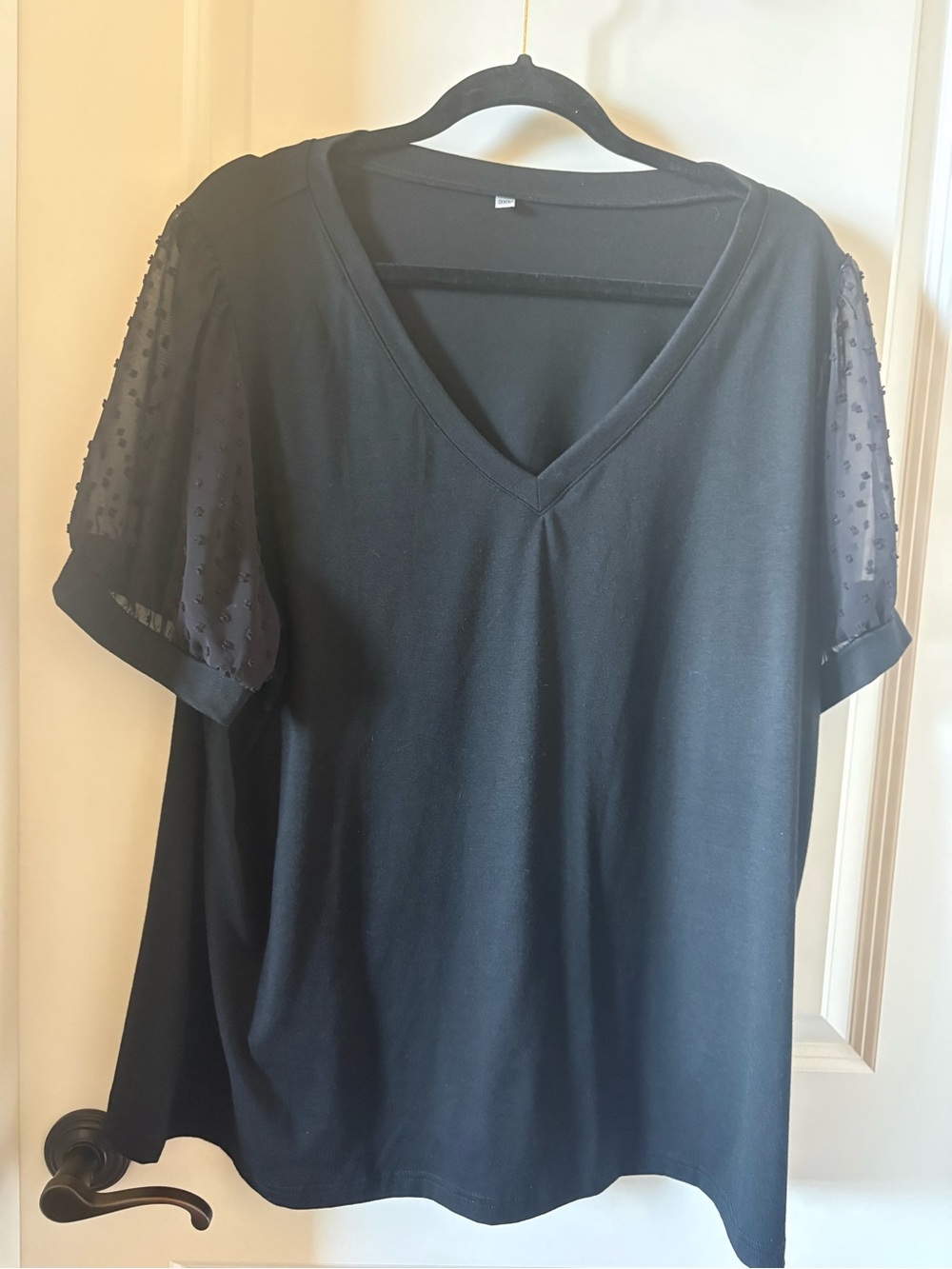 Black V-Neck Women's Top with Sheer Dot Sleeves